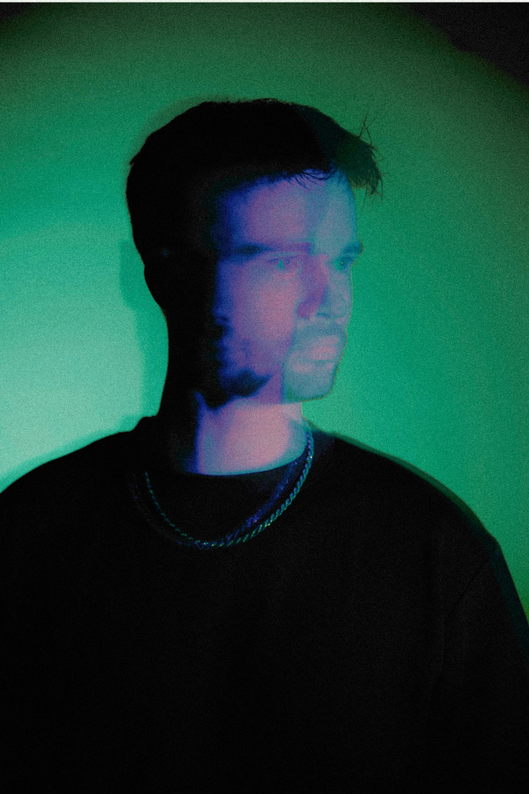 JARBO photographed in green and blue studio light